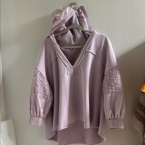 Free People Movement lilac hooded top.